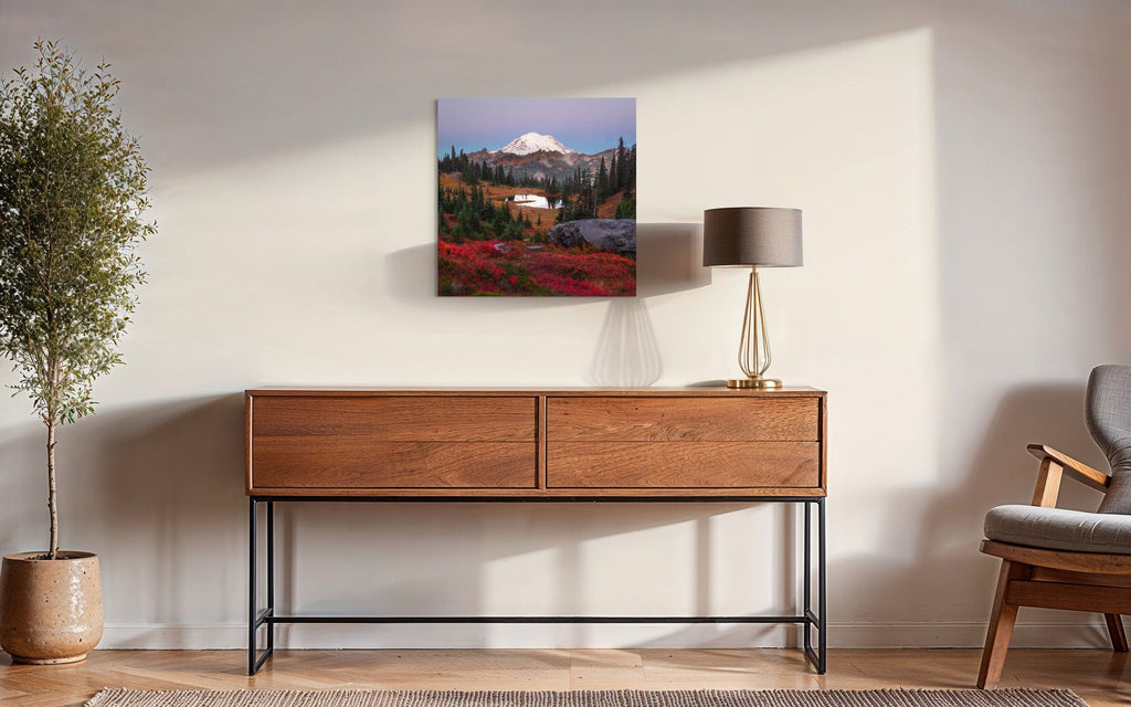 A piece of Mount Rainier art showing a Tipsoo Lake photo hangs in a home.