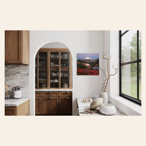 A piece of Mount Rainier art showing a Tipsoo Lake photo hangs in a kitchen.