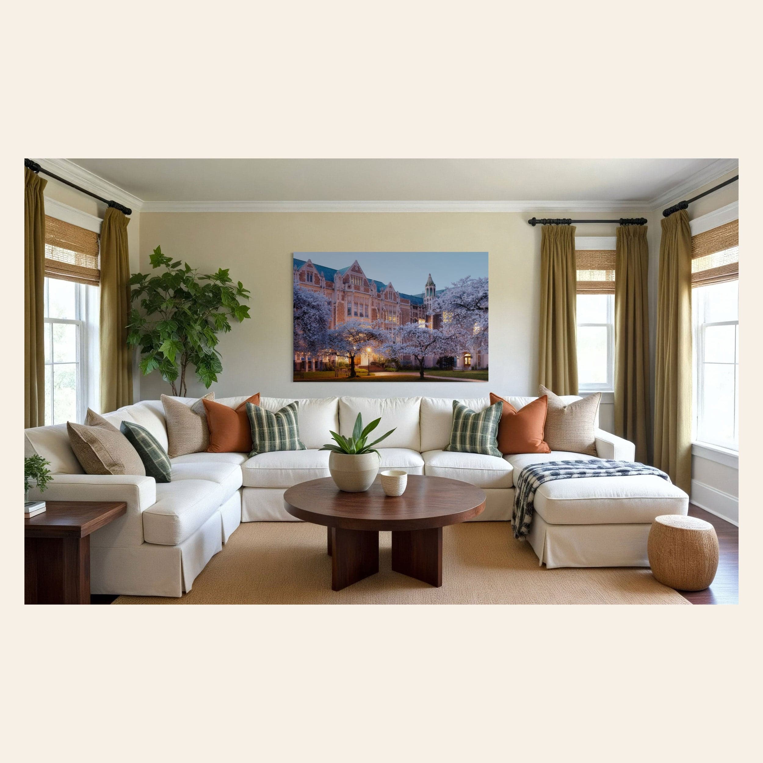 A piece of Seattle art showing the cherry blossoms on the UW campus hangs in a living room.