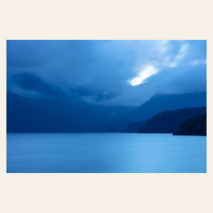 A piece of Vancouver Island art shows a lake photo.