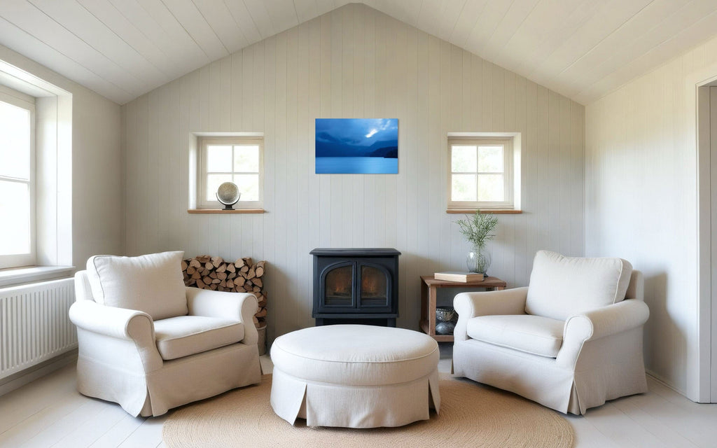 A piece of Vancouver Island art showing a lake photo hangs in a living room.