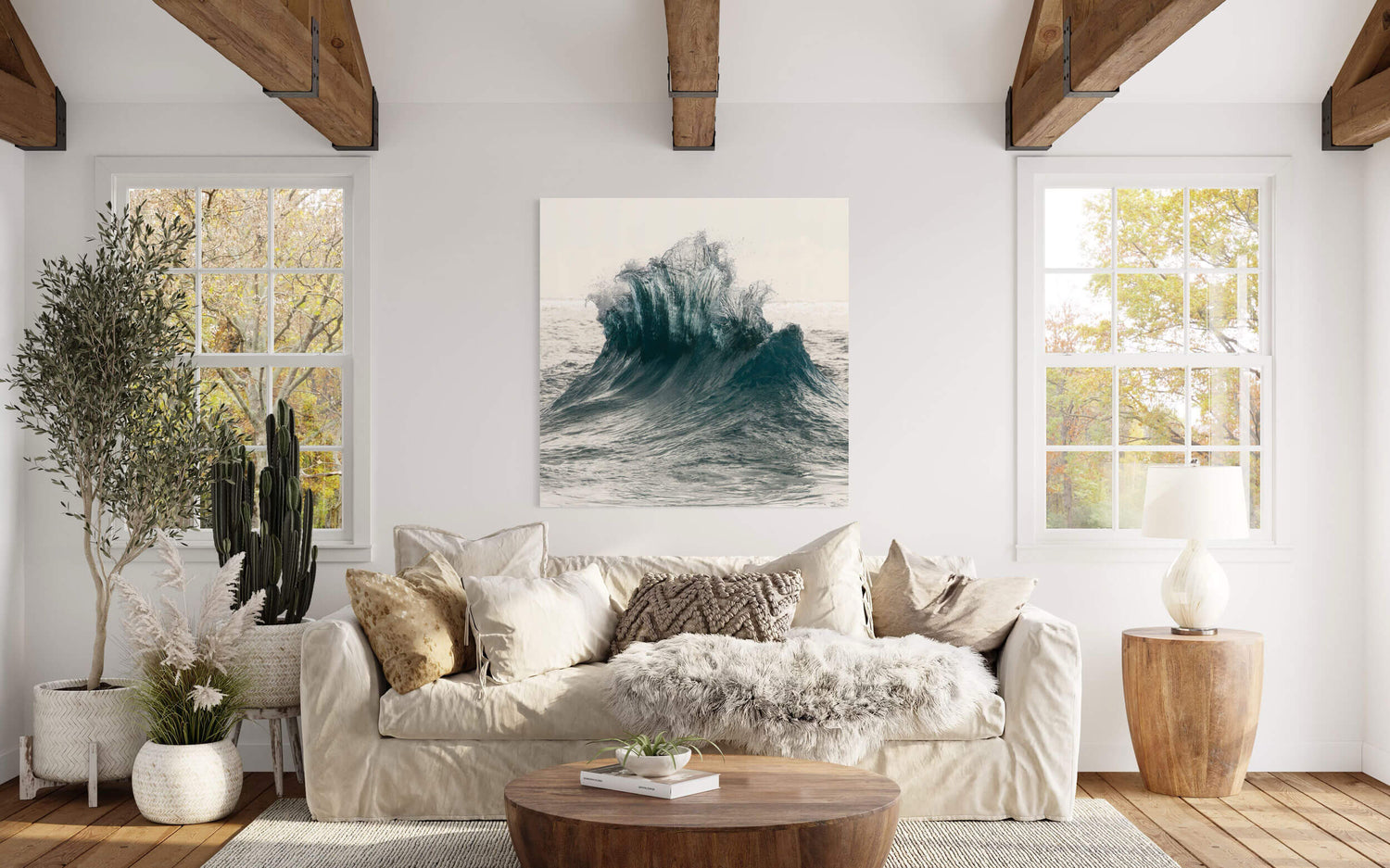 A wave picture of the ocean near Ke'e Beach on Kauai hangs in a living room.