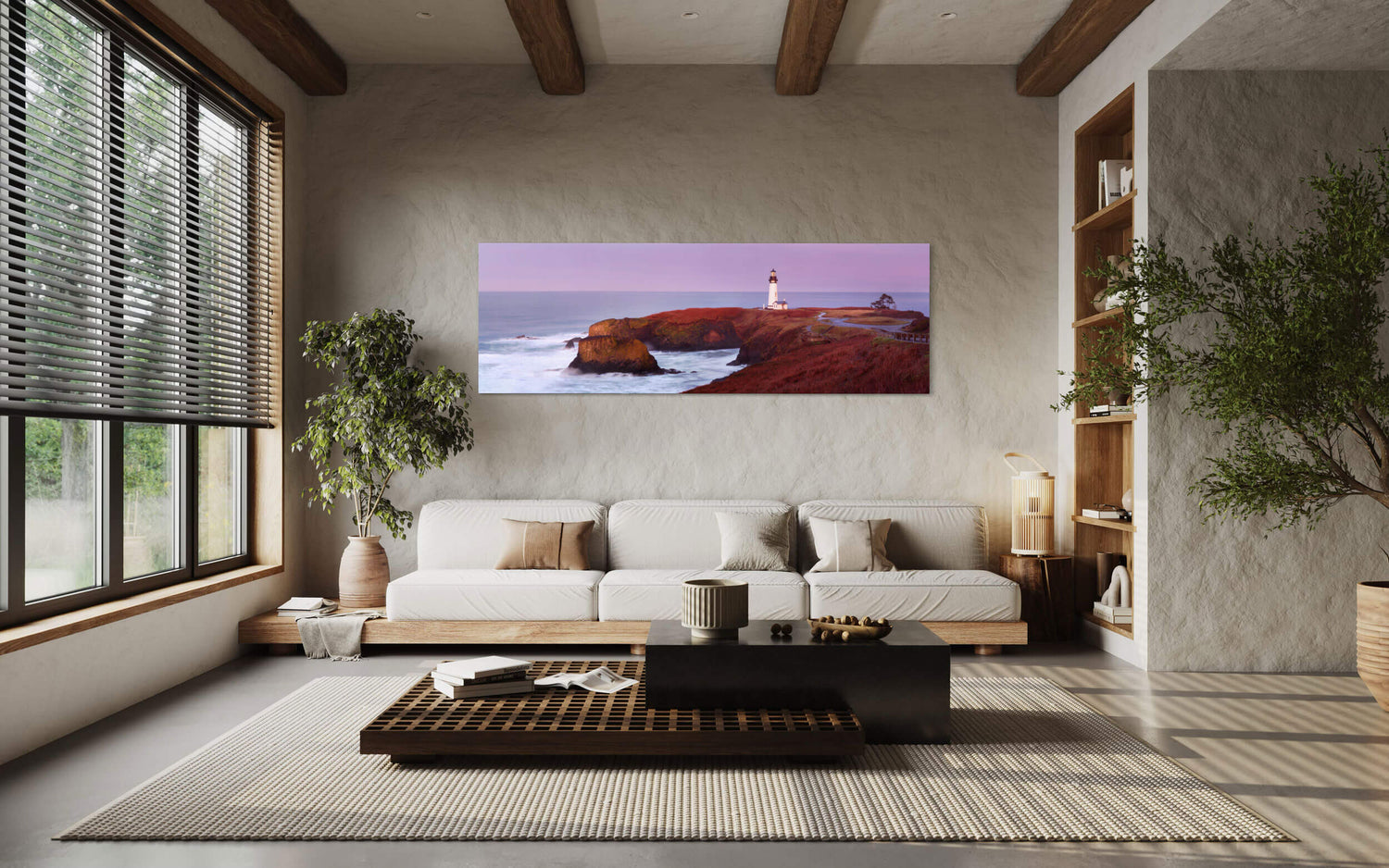 A piece of Oregon art showing the Yaquina Head Lighthouse in Oregon hangs in a living room.