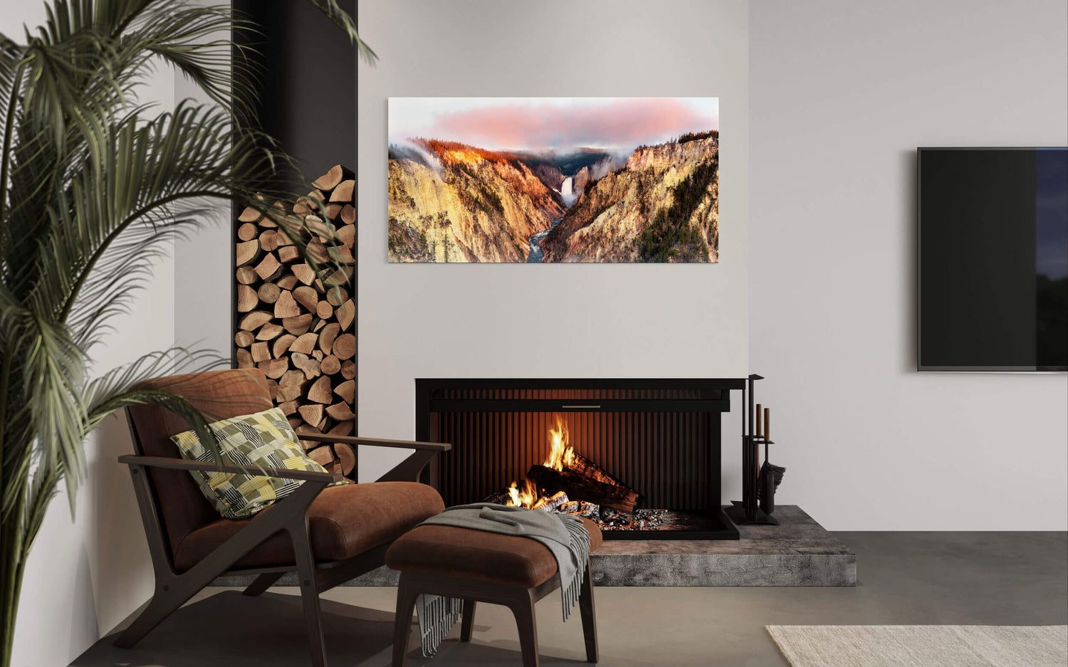 A piece of Yellowstone art shows the view from Artist Point into Yellowstone Canyon hangs in a living room.