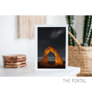 A nature art greeting card showing a Delicate Arch picture in Arches National Park at night.