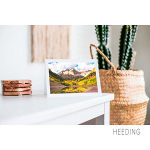 A nature art greeting card showing a Maroon Bells during fall picture near Aspen.