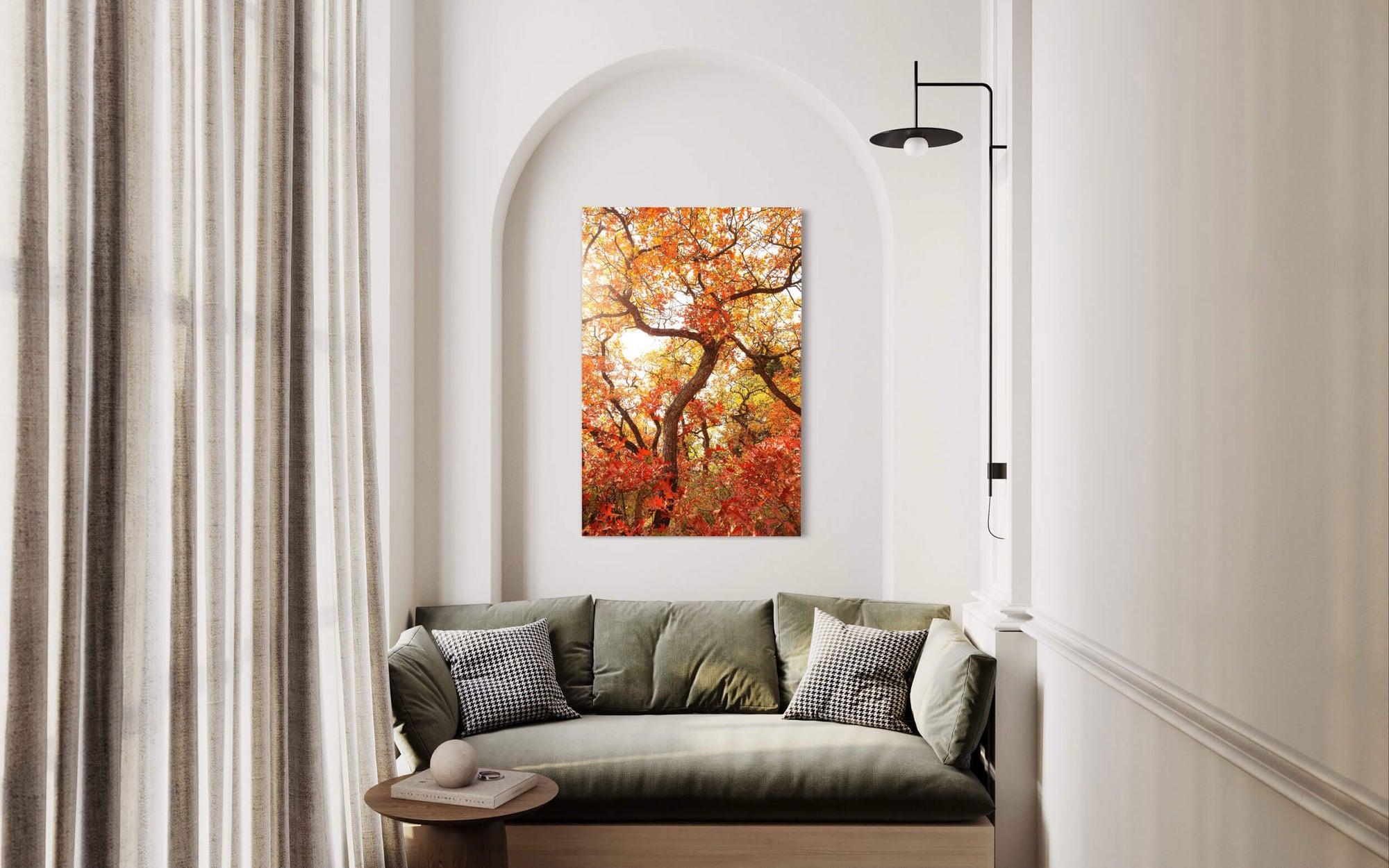 A piece of Colorado art showing the beautiful Ouray fall colors hangs in a living room.
