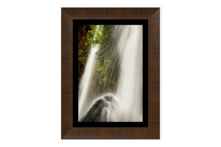 A piece of framed Colorado art shows the waterfall at Rifle Falls State Park.