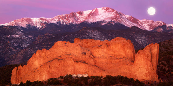 This piece of Colorado Springs art shows Pikes Peak behind the Garden of the Gods.