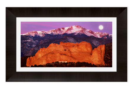 This piece of framed Colorado Springs art shows Pikes Peak behind the Garden of the Gods.