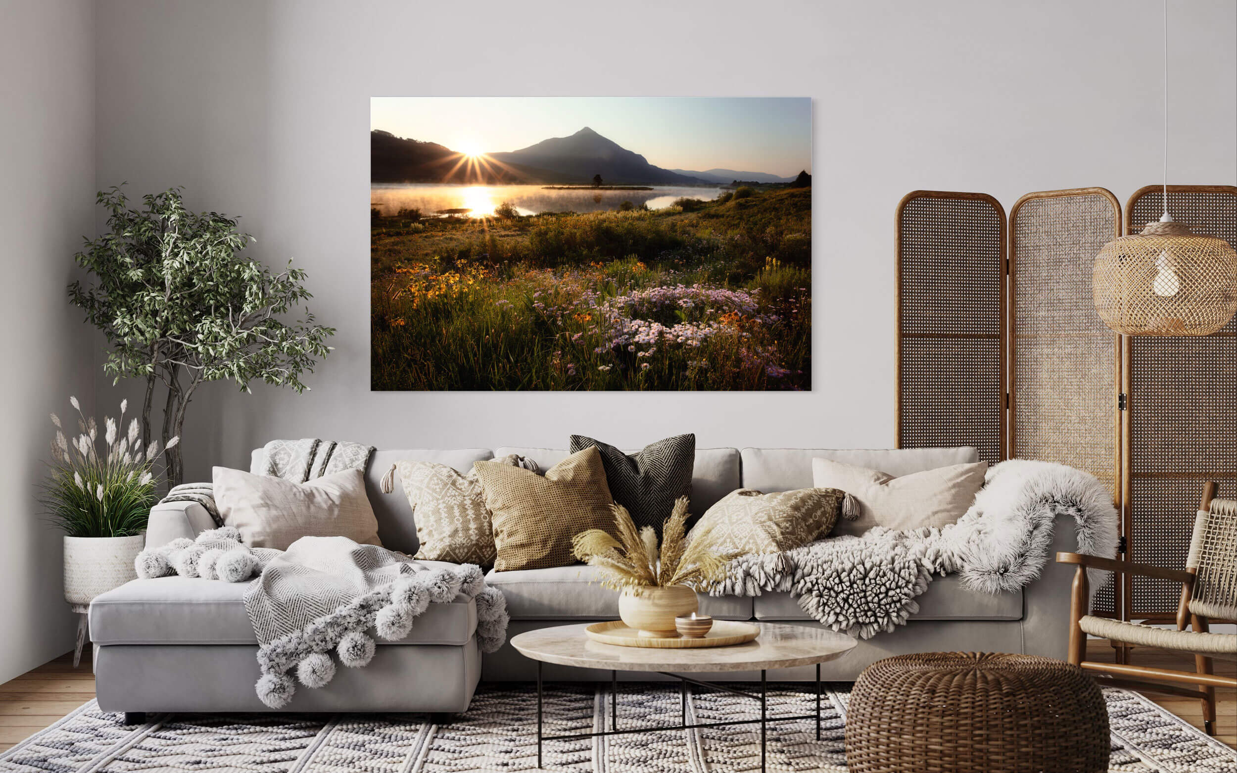 A piece of Crested Butte Art showing Colorado wildflowers at Peanut Lake hangs in a living room.