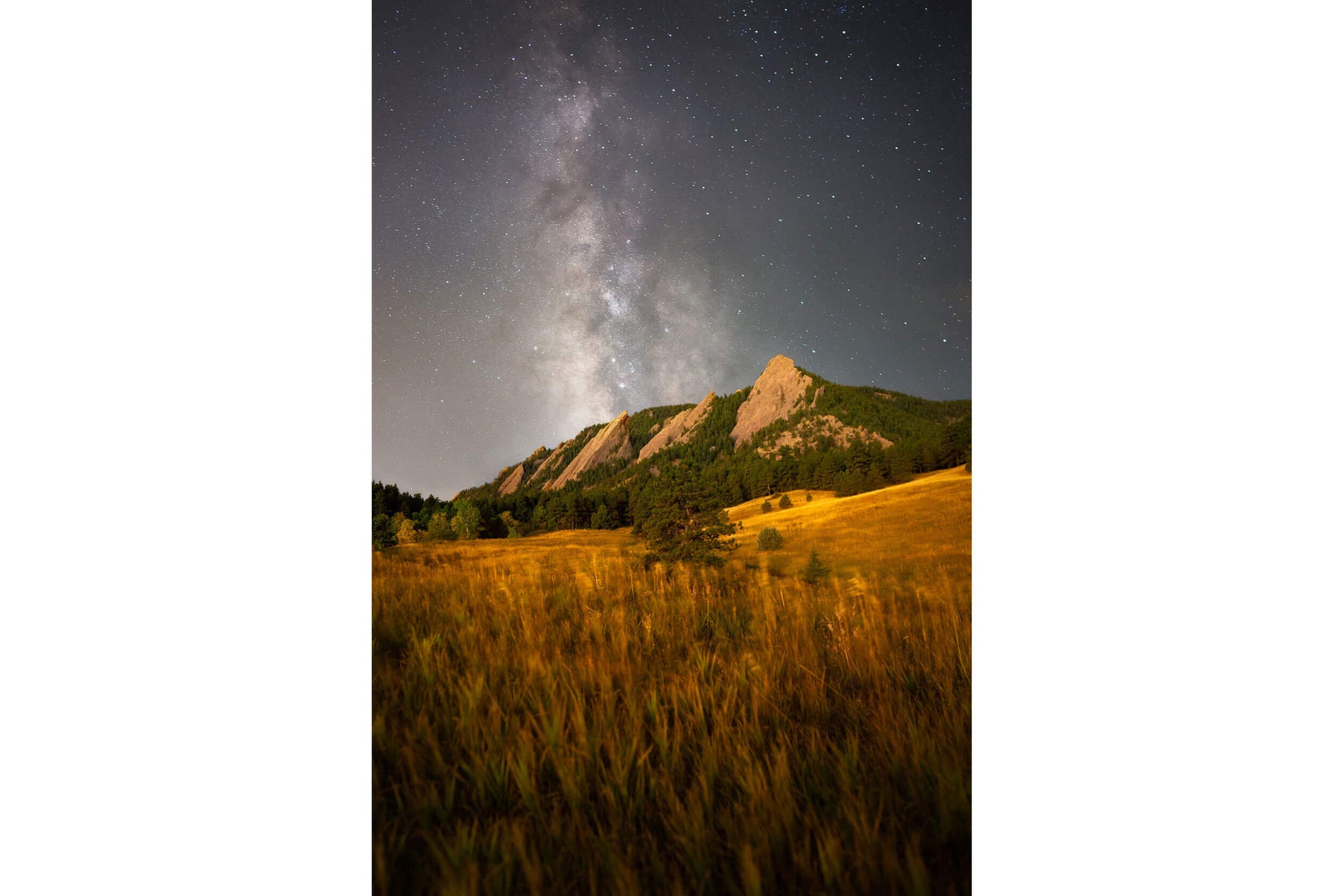 A Boulder Flatirons picture with the Milky Way in Colorado.