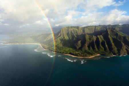 A Napali Coast picture with a double rainbow created on a Kauai helicopter tour.