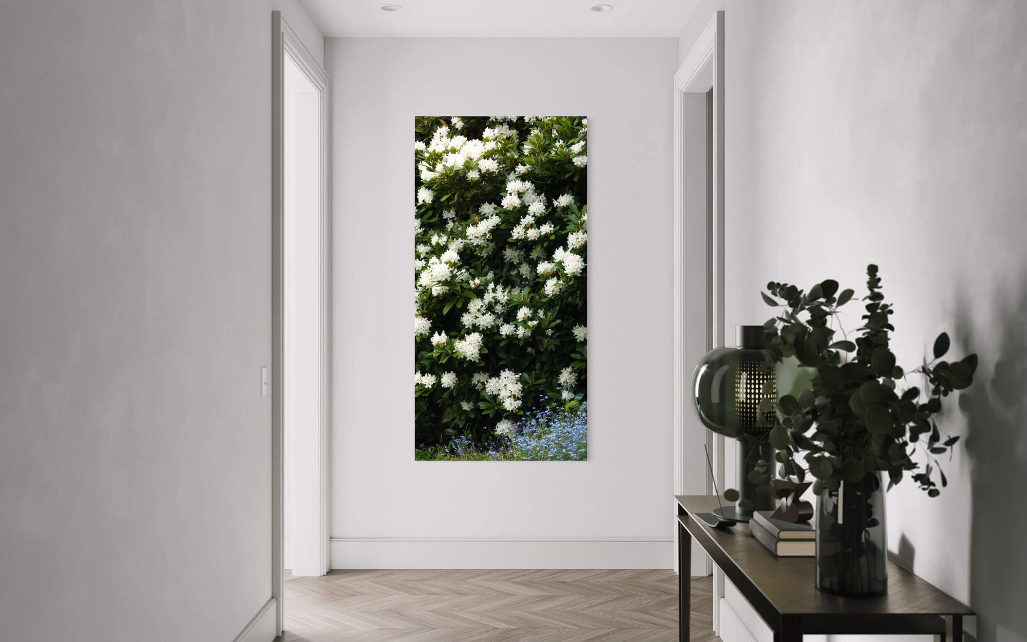 A piece of Seattle art showing a Kubota Garden picture hangs in a hallway.