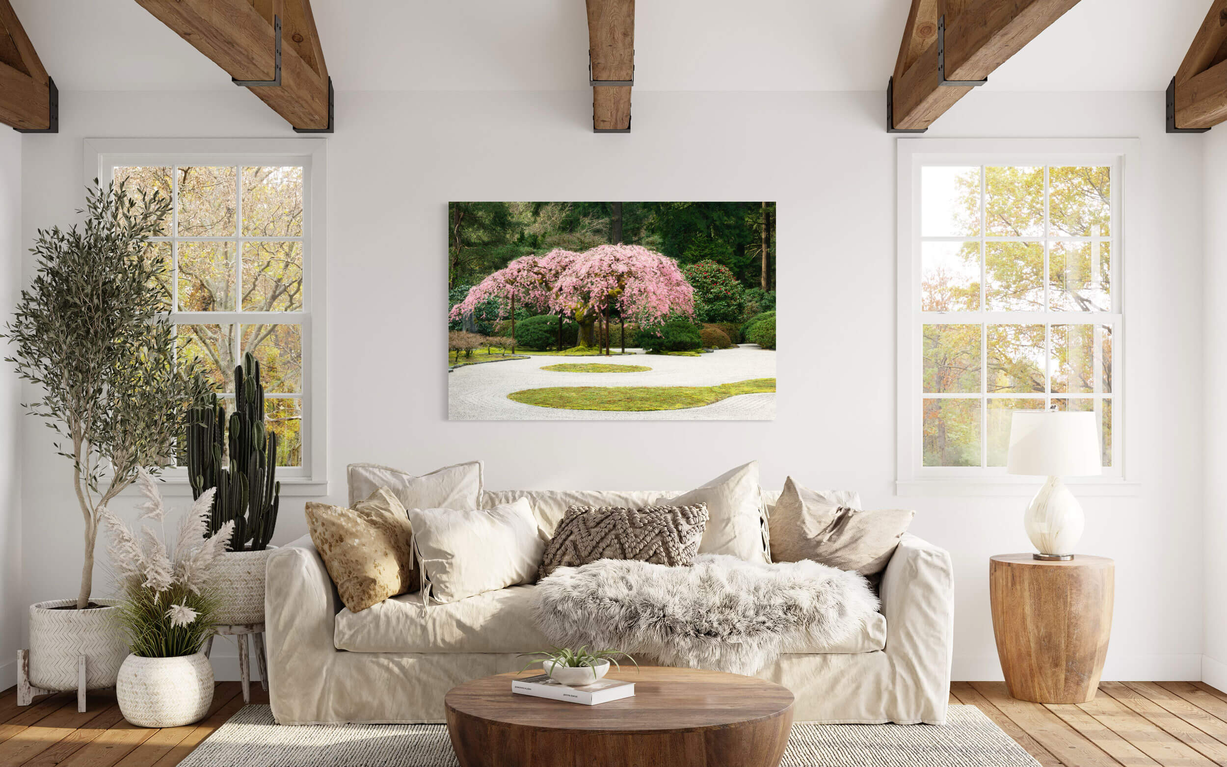 A cherry blossoms picture from Portland Japanese Garden hangs in a living room.