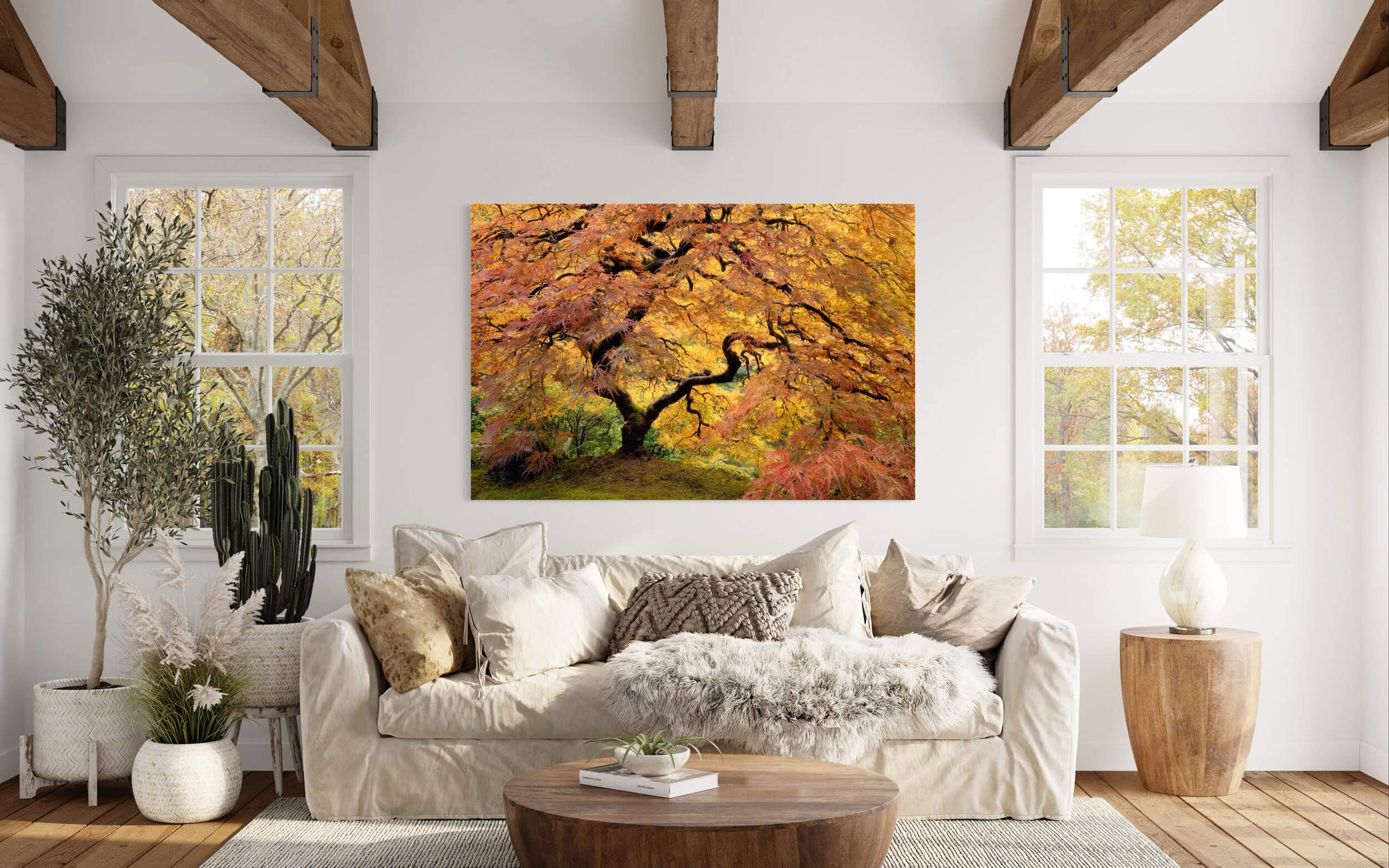 A piece of Japanese Garden art showing the famous maple tree in Portland hangs in a living room.