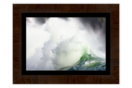 A framed piece of Washington art shows the waves at Cape Disappointment State Park.
